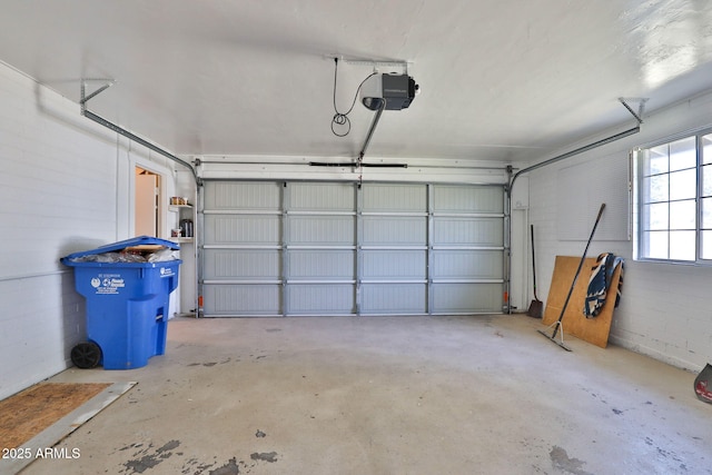 garage featuring a garage door opener