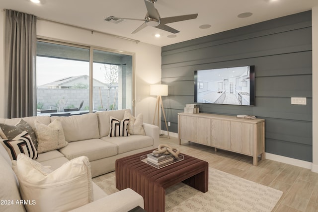 living room with ceiling fan