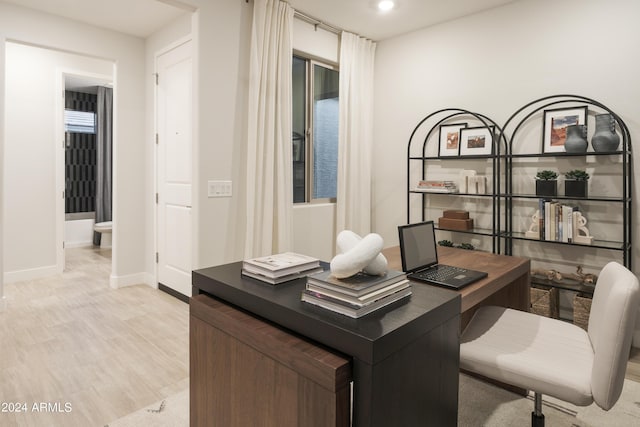 office space featuring light hardwood / wood-style floors