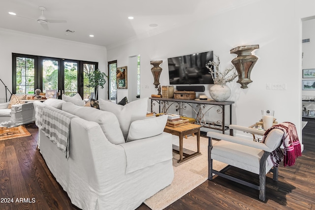 living room featuring dark hardwood / wood-style floors, ceiling fan, crown molding, and french doors