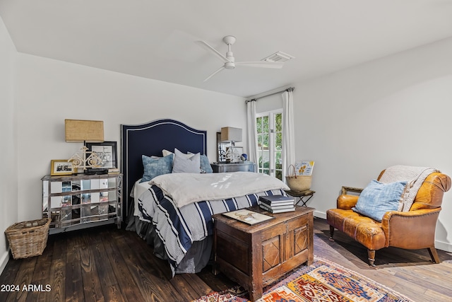 bedroom with hardwood / wood-style floors and ceiling fan