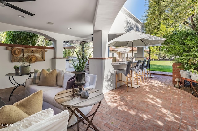 view of patio featuring outdoor lounge area and an outdoor bar