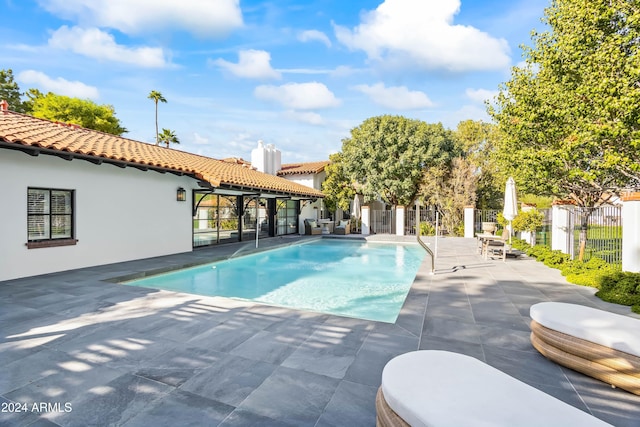 view of pool with a patio area