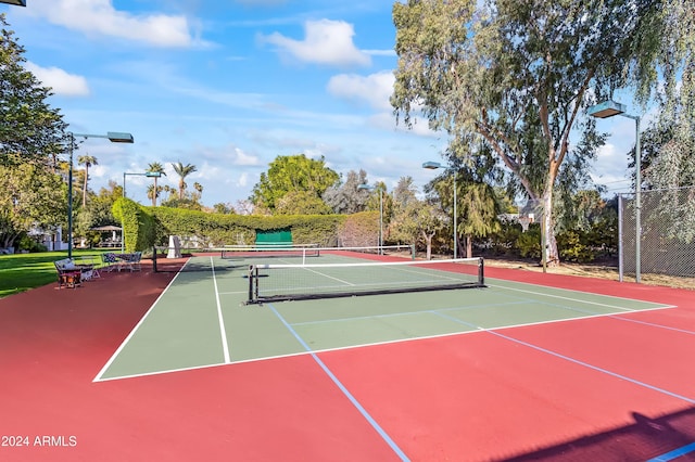 view of tennis court with basketball court