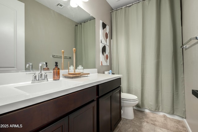 bathroom with visible vents, toilet, vanity, and a shower with curtain