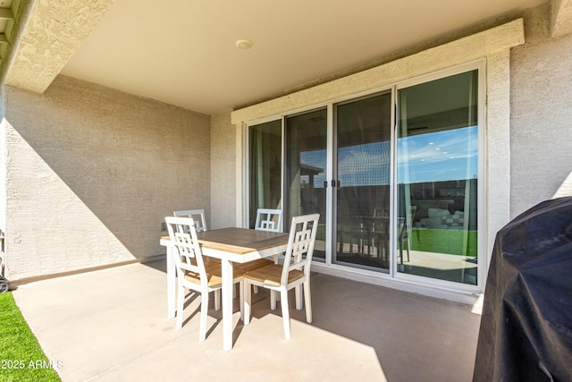 view of patio / terrace featuring outdoor dining space and area for grilling