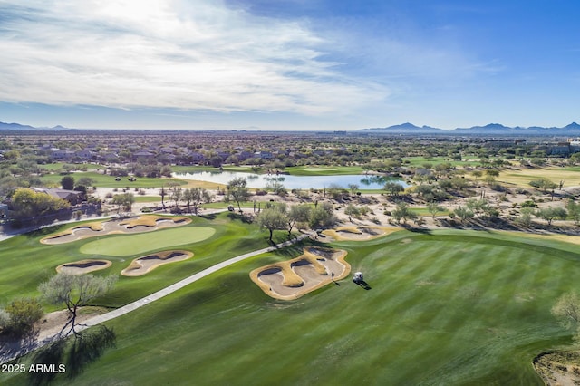 birds eye view of property featuring a water and mountain view