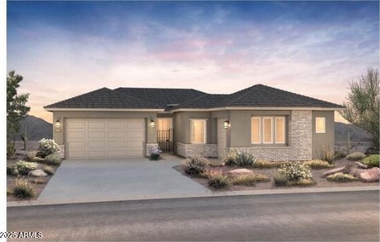 single story home featuring a garage, stone siding, driveway, and stucco siding