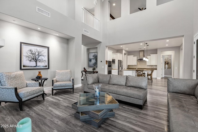 living room with hardwood / wood-style flooring