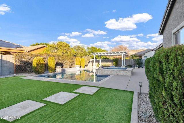 view of yard featuring a swimming pool with hot tub, a patio, and a pergola