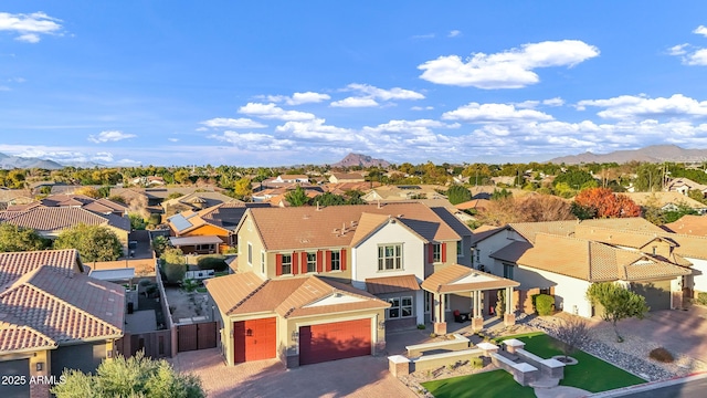 bird's eye view with a mountain view