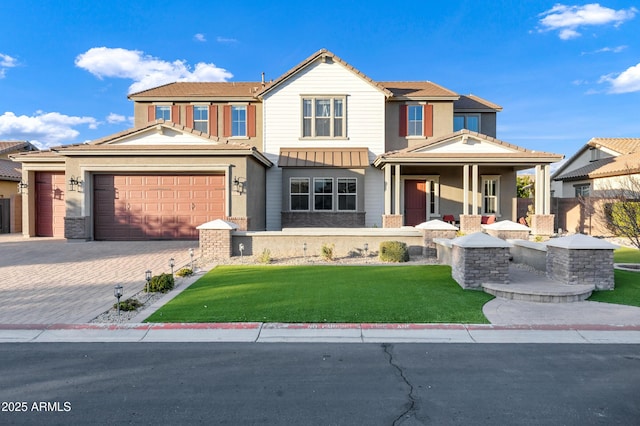 view of front of house featuring covered porch and a front yard