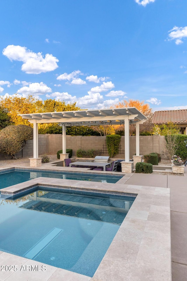 view of swimming pool featuring a pergola, a patio, and an in ground hot tub