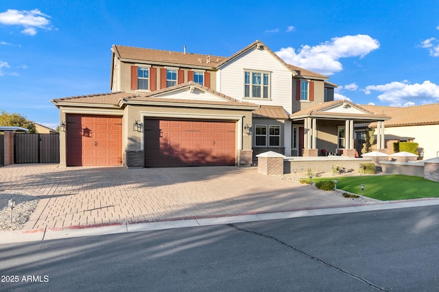 view of front of property featuring a garage