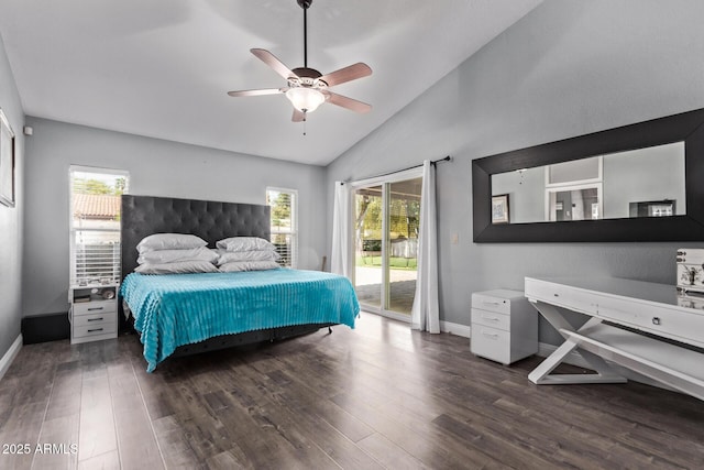 bedroom featuring baseboards, multiple windows, wood finished floors, and access to exterior