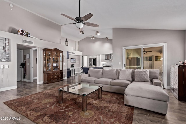 living area featuring high vaulted ceiling, visible vents, dark wood-style floors, and ceiling fan