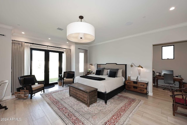 bedroom with ornamental molding and french doors