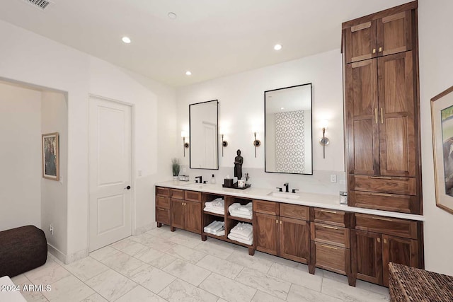 bathroom with vanity and backsplash