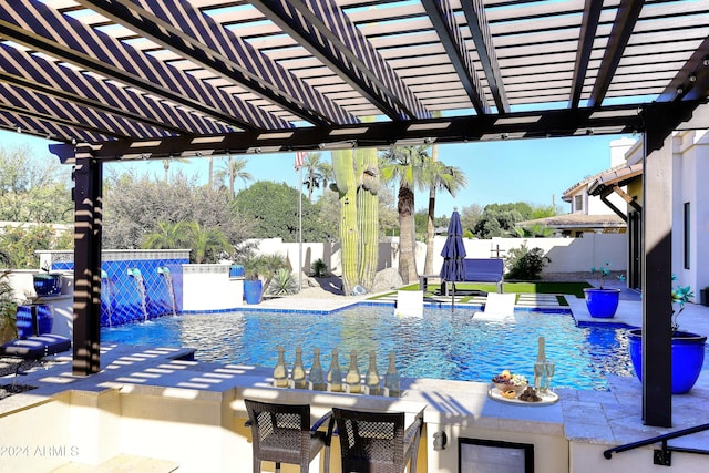 view of pool with a pergola, pool water feature, and a patio area