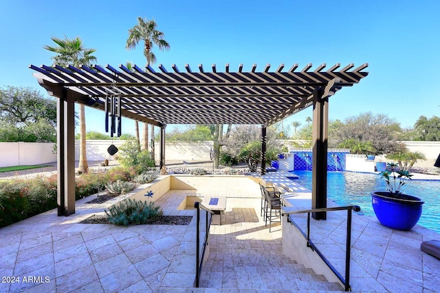 view of patio featuring a pergola, an outdoor bar, and a fenced in pool