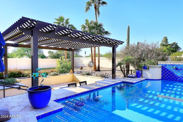 view of swimming pool with a pergola and a patio