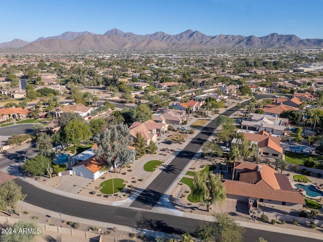 birds eye view of property featuring a mountain view