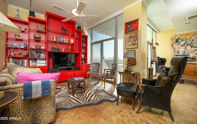 living area featuring visible vents, crown molding, ceiling fan, and expansive windows