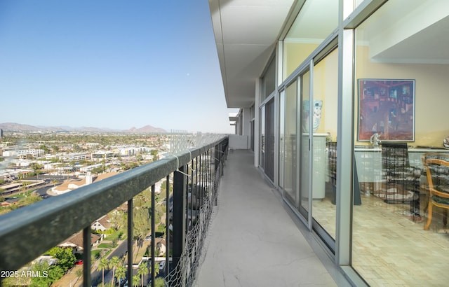 balcony featuring a mountain view