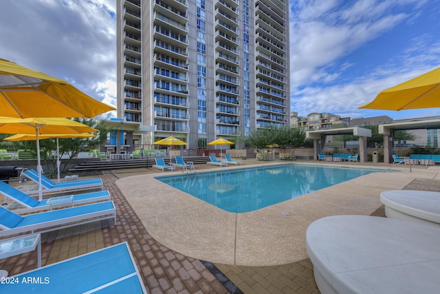 pool with a patio area