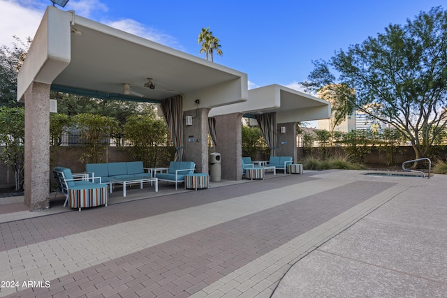 view of patio / terrace featuring a gazebo, a fenced in pool, an outdoor hangout area, and fence