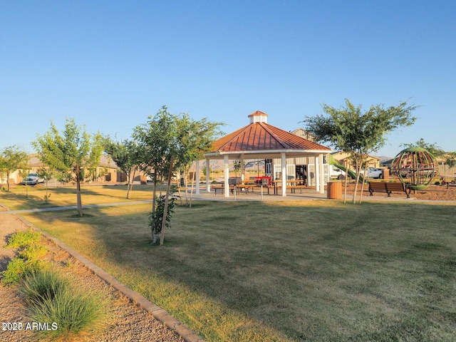 view of community with a gazebo and a yard