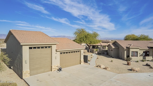 view of front of home featuring a mountain view