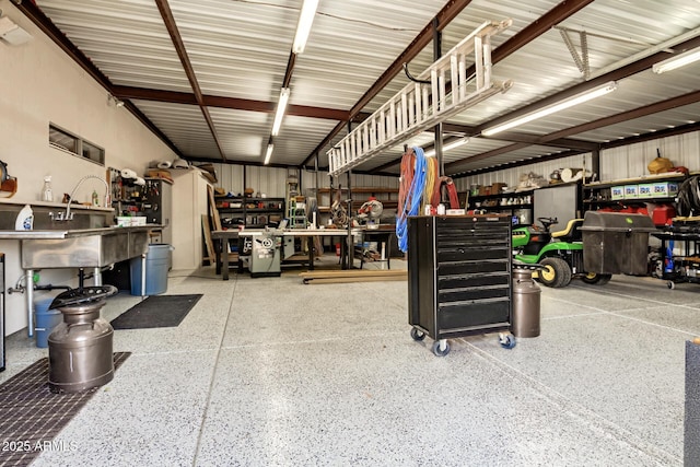 garage with a workshop area