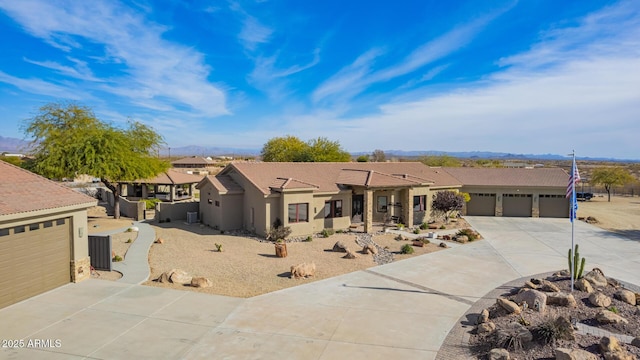 ranch-style house featuring a garage