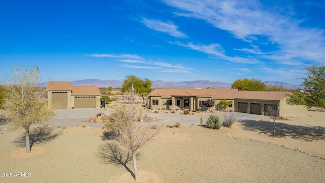 view of front of home with a mountain view