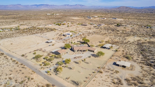 drone / aerial view featuring a mountain view