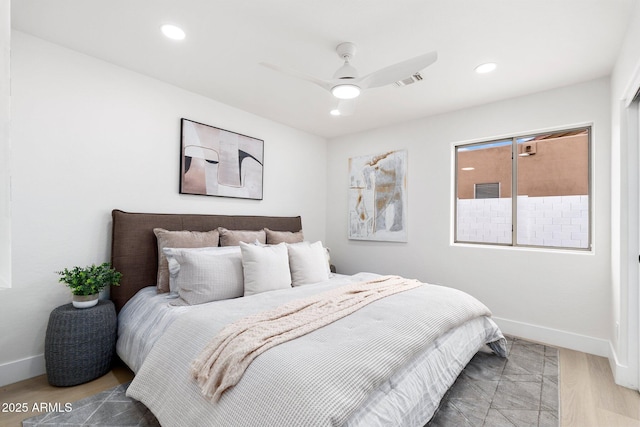 bedroom with recessed lighting, visible vents, baseboards, and light wood-style floors