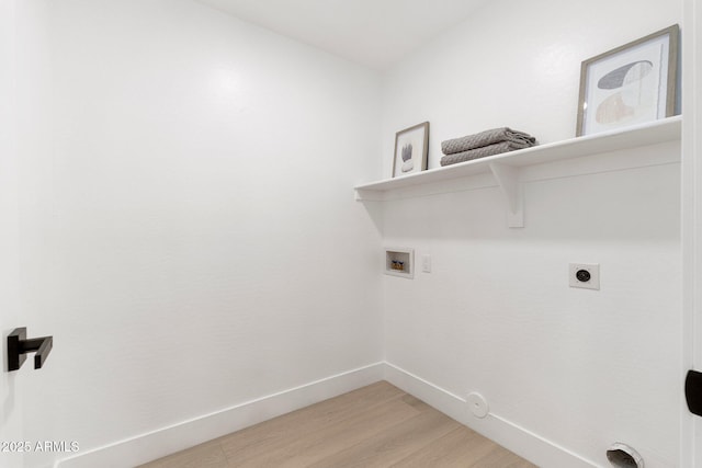 laundry room with baseboards, laundry area, hookup for a washing machine, hookup for a gas dryer, and electric dryer hookup