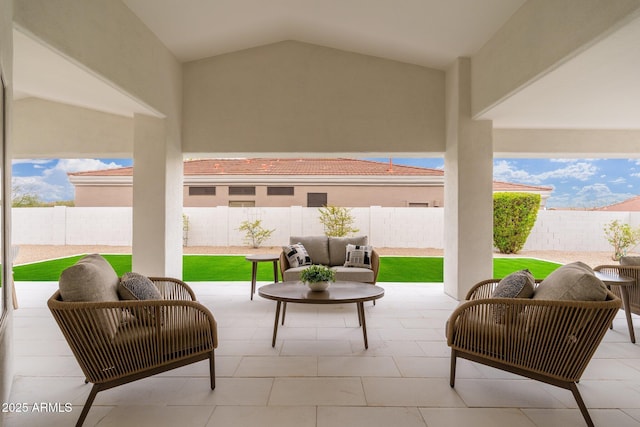 view of patio with outdoor lounge area and a fenced backyard