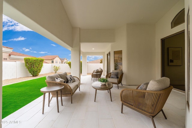 view of patio featuring a fenced backyard and outdoor lounge area