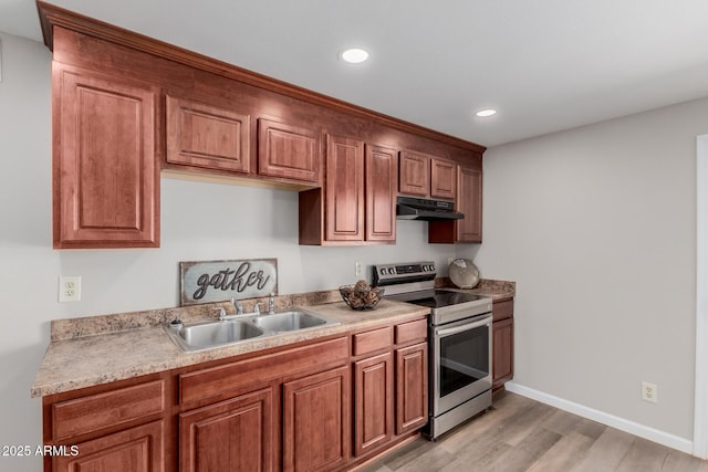 kitchen featuring light wood-type flooring, sink, and stainless steel electric stove