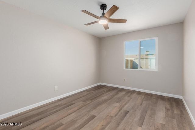 unfurnished room featuring ceiling fan and light hardwood / wood-style flooring