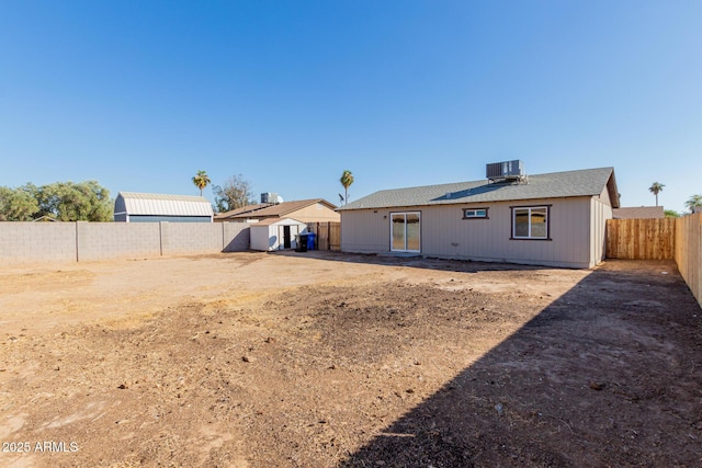 back of property featuring cooling unit