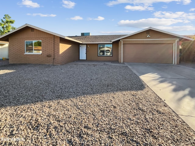 ranch-style home with a garage