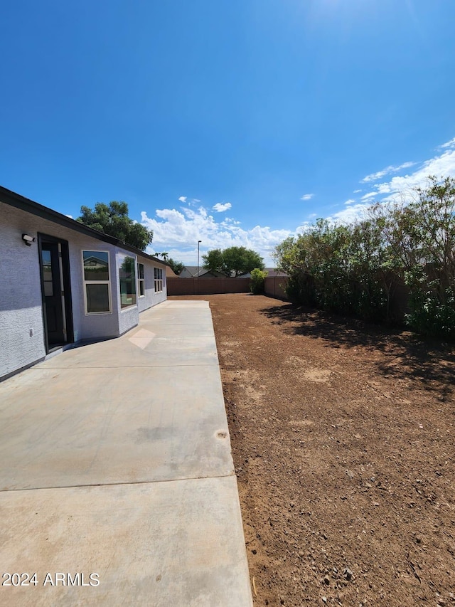 view of yard with a patio area