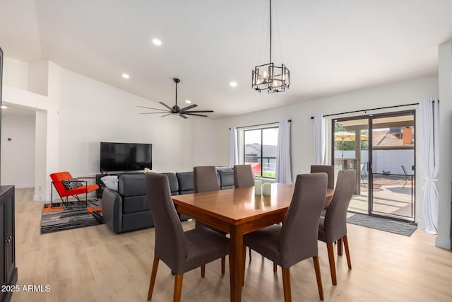 13918 N 78th Ave, Peoria, AZ 85381 - dining space featuring light wood-type flooring, vaulted ceiling, a chandelier, recessed lighting, and ceiling fan