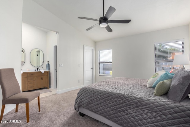 13918 N 78th Ave, Peoria, AZ 85381 - bedroom with light colored carpet, vaulted ceiling, multiple windows, ensuite bath, and baseboards