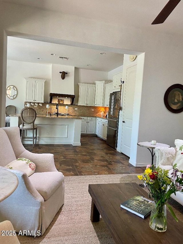 20502 W Ridge Rd, Buckeye, AZ 85396 - living room featuring a ceiling fan