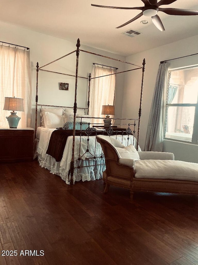 20502 W Ridge Rd, Buckeye, AZ 85396 - bedroom with wood finished floors and a ceiling fan