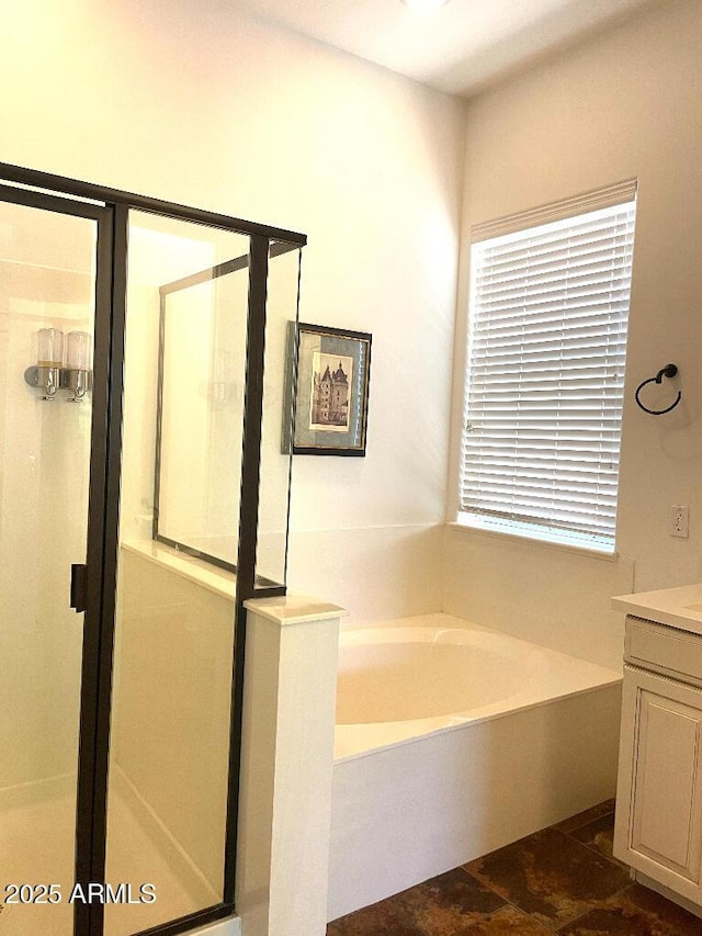 20502 W Ridge Rd, Buckeye, AZ 85396 - full bathroom with vanity, a bath, and a stall shower